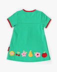 Premium green summer dress with short sleeves, GOTS certified organic cotton, stylish fruit appliques, red trim details by Toby Tiger at brixbailey.com