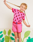 Premium Pink Ladybug Print Baby T-Shirt with Snap Buttons and Red Trim, 100% GOTS Organic Cotton by Toby Tiger at brixbailey.com