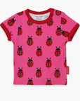 Premium Pink Ladybug Print Baby T-Shirt with Red Trim, GOTS Certified Organic Cotton, Snap Button Neck for Easy Dressing by Toby Tiger at brixbailey.com