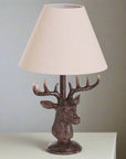 Handcrafted stag head table lamp with antique bronze resin base and natural linen shade, rustic home decor by RoomLondon at brixbailey.com