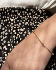 Stardrop Figaro Chain Bracelet, dusty pink gold vermeil, dainty shimmering crystals, stylish star-inspired jewelry, best-selling luxury bracelet by Lezzeri at brixbailey.com
