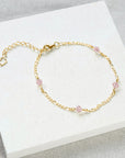 Stardrop Figaro chain bracelet, dusty pink gold vermeil, dainty shimmering crystals, luxury handcrafted jewelry, stylish best-selling design by Lezzeri at brixbailey.com