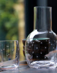 A Crystal Carafe Set with Stars Design