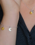 Luxury sterling silver sun and moon pendant necklace, delicate satellite chain with Murano glass gold leaf charm, dainty stacking jewelry by Lezzeri at brixbailey.com