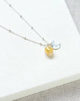 Luxury sun and moon pendant necklace, sterling silver satellite chain with Murano glass charm, dainty stacking jewelry, best-selling celestial necklace by Lezzeri at brixbailey.com