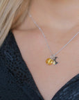 Luxury sun and moon pendant necklace, sterling silver satellite chain with Murano glass charm, dainty stacking jewelry, best-selling celestial jewelry by Lezzeri at brixbailey.com