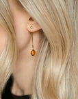 Luxury gold vermeil star stud earrings, celestial dainty stacking studs with shimmering textured edges by Lezzeri at brixbailey.com