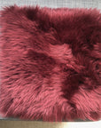 Premium British sheepskin square seat cover, 37cm burgundy, 100% natural free-range wool, luxury hypoallergenic fur, handcrafted in UK, sustainable and machine washable by Wildash London at brixbailey.com