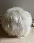 Luxury Icelandic sheepskin pouffe, elegant long fur boule footstool, stylish cool grey home decor by Wildash London at brixbailey.com