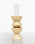 medium totem wooden vase no 3 with glass tube removed on a wooden table