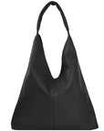 Black boho triangular leather shoulder bag by Brix + Bailey with clip closure at www.brixbailey.com