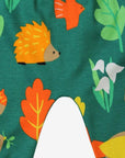 Bright colorful organic kids yoga pants with orange yellow hedgehog bird leaf snowdrop print, premium handcrafted GOTS certified cotton by Toby Tiger at brixbailey.com