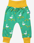 Premium organic cotton kids yoga pants with duck print, soft GOTS-certified fabric, playful green and yellow design, comfortable waistband and cuffs by Toby Tiger at brixbailey.com