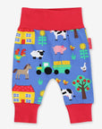 Comfortable Baby Yoga Pants with Farm Animal Print in Soft Organic Cotton for Crawling and Walking by Toby Tiger at brixbailey.com