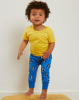 Premium organic cotton yoga pants with dog print, stylish and comfortable for kids, eco-friendly GOTS certified, wide ankle cuffs, farm-themed collection by Toby Tiger at brixbailey.com