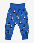 Premium organic cotton kids yoga pants with dog print, stylish green ankle cuffs, comfortable for play and relaxation by Toby Tiger at brixbailey.com