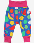 Premium kids yoga pants with vibrant fruit print, stylish and comfortable, made from 100% organic GOTS-certified cotton by Toby Tiger at brixbailey.com