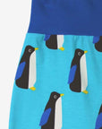 Premium organic cotton yoga pants for toddlers, soft blue with cute penguin print, elastic waistband and cuffs, GOTS certified, machine washable by Toby Tiger at brixbailey.com