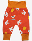 Women's organic cotton yoga pants with seagull print by Toby Tiger in vibrant orange at www.brixbailey.com