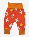 Women's organic cotton yoga pants with seagull print by Toby Tiger in vibrant orange at www.brixbailey.com