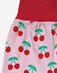 Premium organic cotton kids yoga pants with cherry print, stylish fold-over waistband, comfortable and breathable, best-selling eco-friendly design by Toby Tiger at brixbailey.com