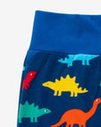Vibrant Rainbow Dinosaur Print Organic Kids Yoga Pants with Comfortable Waist and Ankle Bands - 100% GOTS Certified Cotton by Toby Tiger at brixbailey.com