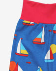 Premium organic cotton kids yoga pants with sailboat print, stylish red waistband, comfortable ankle cuffs, GOTS certified, soft and breathable by Toby Tiger at brixbailey.com