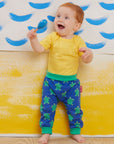 Premium baby pants with turtle applique, soft organic cotton, sustainable GOTS certified, stylish neutral tones, best-selling toddler essentials by Toby Tiger at brixbailey.com