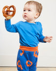 Stylish Dark Blue Yoga Pants with Pretzel Print for Kids, Comfortable Organic Cotton Baby Yoga Outfit by Toby Tiger at brixbailey.com
