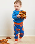 Stylish Dark Blue Kids Yoga Pants with Pretzel Print, Comfortable Elastic Waistband, Organic Cotton Baby Yoga Outfit by Toby Tiger at brixbailey.com