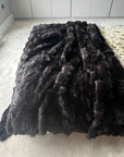 Luxury dark chocolate Tuscan shearling throw, premium fur blanket, best-selling sheepskin rug, stylish sustainable home accent by Wildash London at brixbailey.com