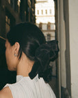 Twisted Knot Hoops