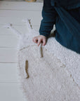 Snail-Shaped Rug in Sage and Natural Tones - Eco-Friendly & Handcrafted for Comfort and Style by Lorena Canals at www.brixbailey.com
