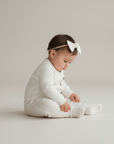 White Ribbed Cotton Baby Romper with Button Front