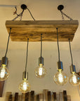 Wooden Beam Pendant with Amber Globe Bulbs