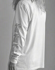 Luxury oversized off-white long sleeve with matte black graphics, premium 200 gsm organic cotton, handcrafted limited edition unisex top by WWOOLLFF CO. at brixbailey.com