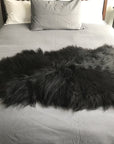 Luxury Icelandic natural black undyed sheepskin hide, premium eco-tanned, sustainably sourced, soft and elegant home decor by Wildash London at brixbailey.com