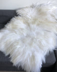 Luxury Icelandic white long fur sheepskin rug, premium 100% natural undyed sheepskin throw, handcrafted for warmth and texture by Wildash London at brixbailey.com