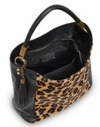 Large leopard print calf hair leather grab bag by Sostter with removable crossbody strap at www.brixbailey.com
