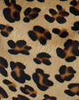 Large leopard print calf hair leather grab bag by Sostter with removable crossbody strap at www.brixbailey.com