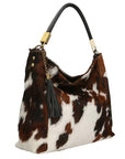 Spotted Cow Print Calf Hair Leather Tassel Grab Bag - Brix + Bailey