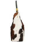 Spotted Cow Print Calf Hair Leather Tassel Grab Bag - Brix + Bailey
