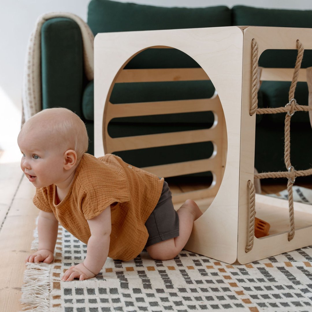 Ette Tete sustainable wooden furniture showcasing multifunctional climbing frames and activity centers for children.