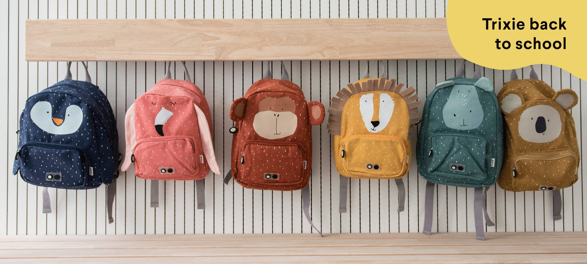 Alt text: Trixie Baby organic children's accessories and toys — playful animal characters, sustainable materials, curated by Brix + Bailey