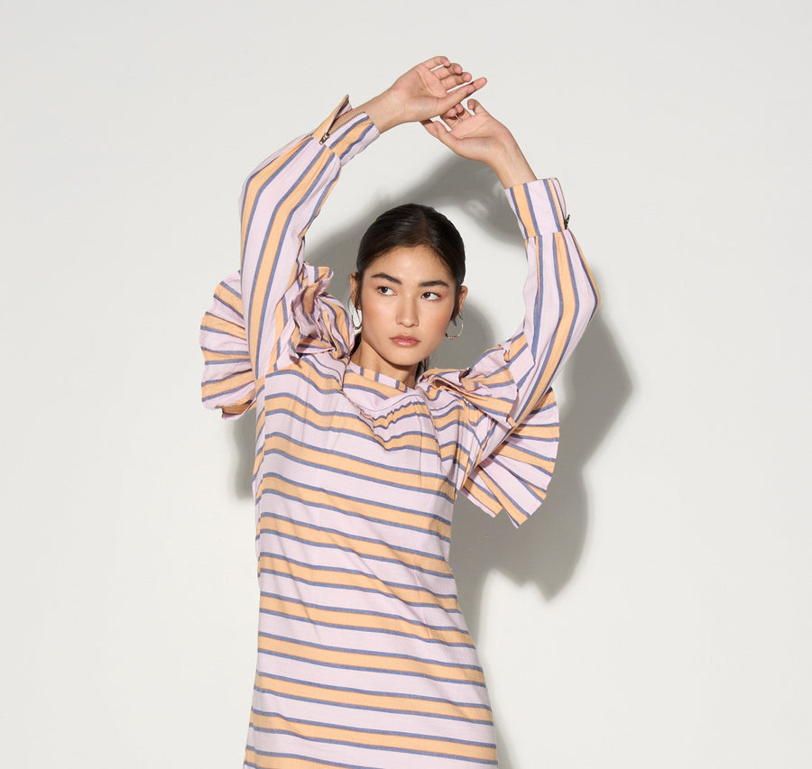 Luxury striped dress with ruffle shoulders, feminine and edgy, premium cotton fabric, best-selling statement piece by GILD at brixbailey.com