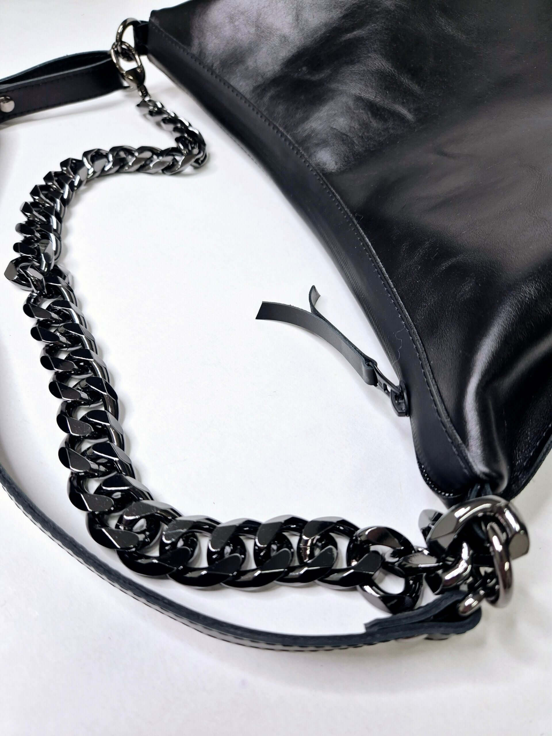 Black Leather Handbag with Metallic Accents, Crossbody