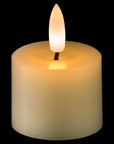 White LED tealight with realistic flickering flame, flameless and battery-powered for worry-free ambiance. by RoomLondon at brixbailey.com