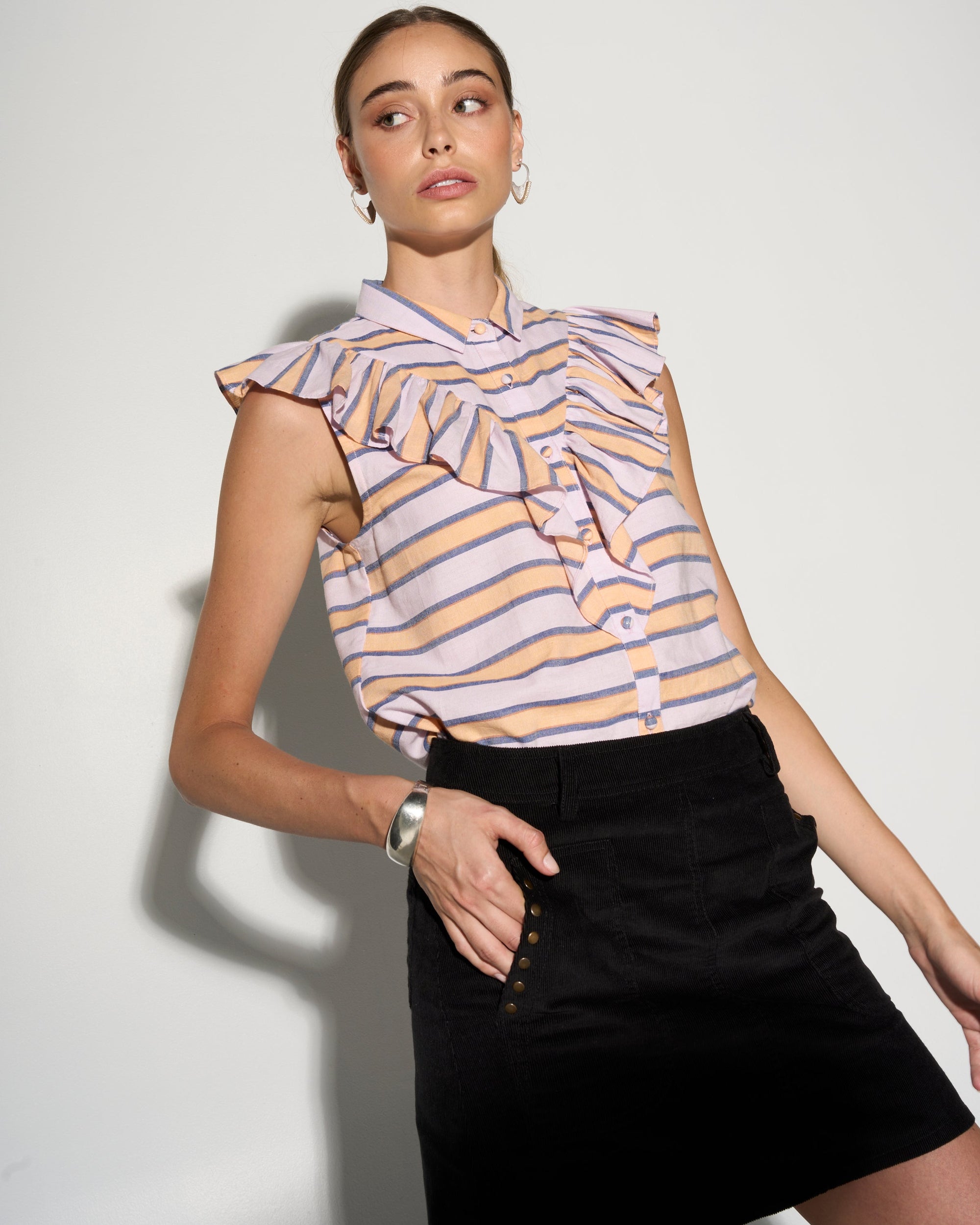 Premium feminine ruffle blouse, stylish multi-color stripe print, dramatic yoke ruffle, handloomed cotton, luxury fabric buttons, trending summer top by GILD at brixbailey.com