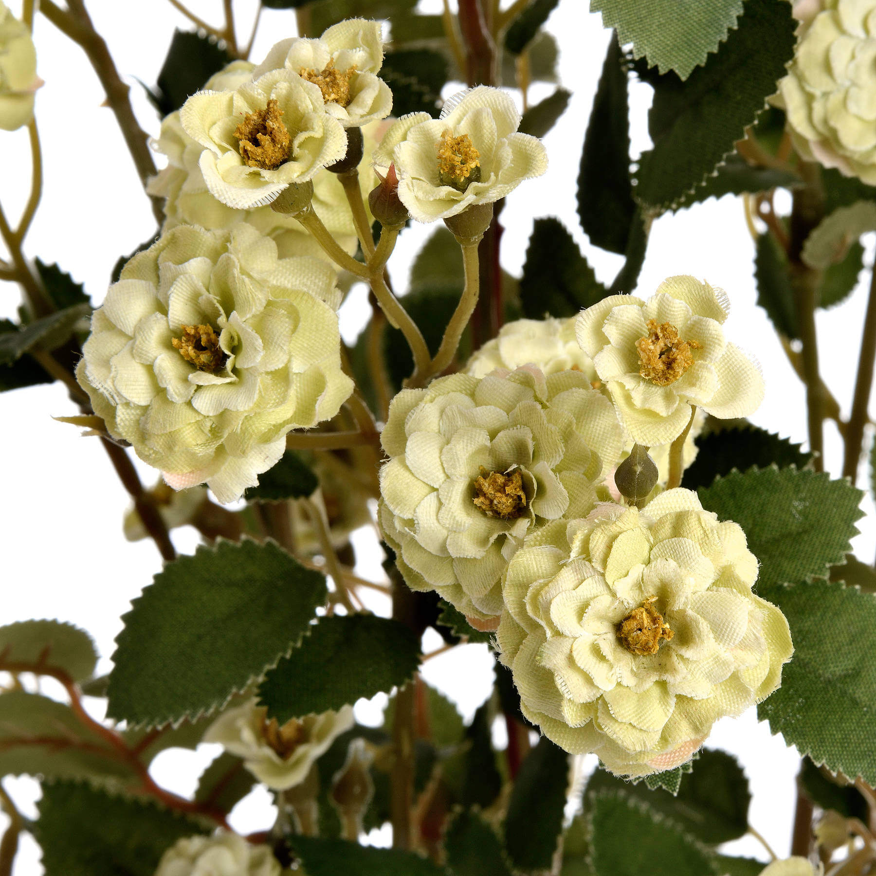 a close-up view of a realistic faux green rose stem on a modern leather bag