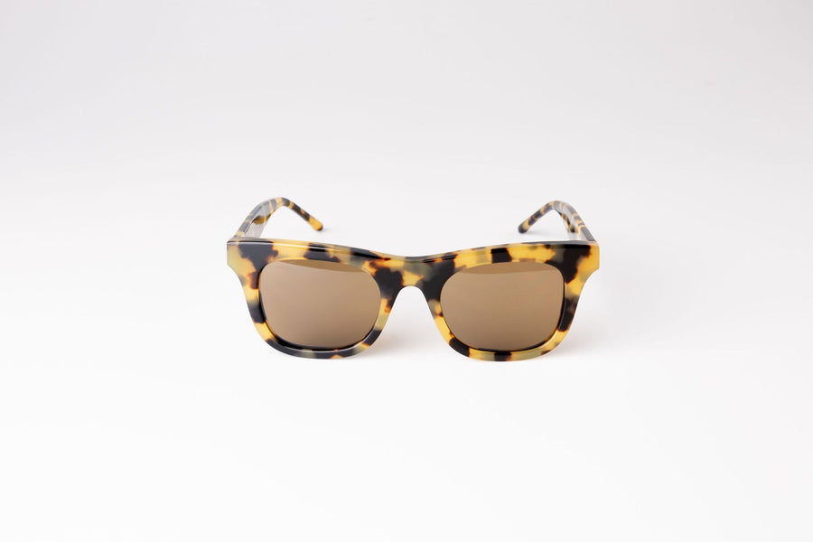 You can't go wrong with this classic genderless shape with a tortoiseshell frame and light tan lens - Category 2 lens - 100% UV protection - Italian M49 Mazzucchelli bioacetate biodegradable frames - Includes recycled PET lens cleaning pouch and bamboo hard case by Reecy at brixbailey.com